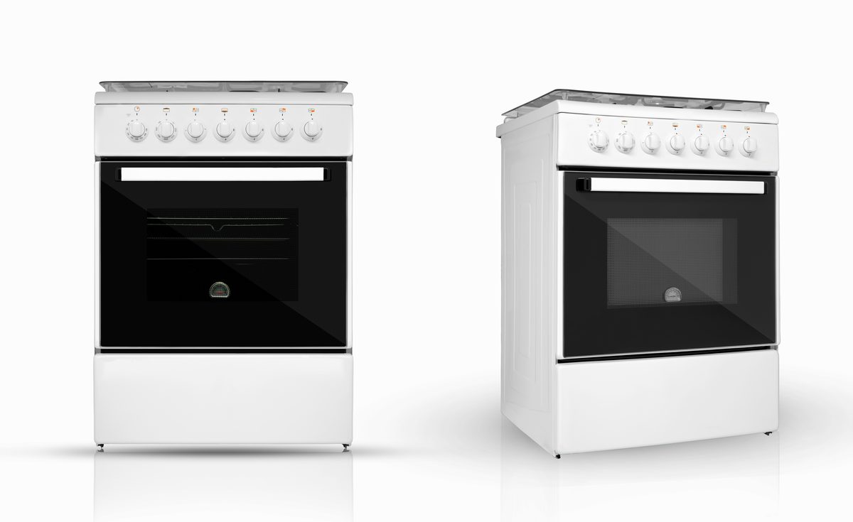 Two white freestanding ovens with black glass doors and control knobs, on a white background